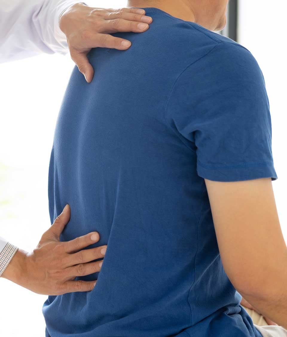 Beverly Hills, FL Chiropractor Chiropractor is performing a treatment to a man