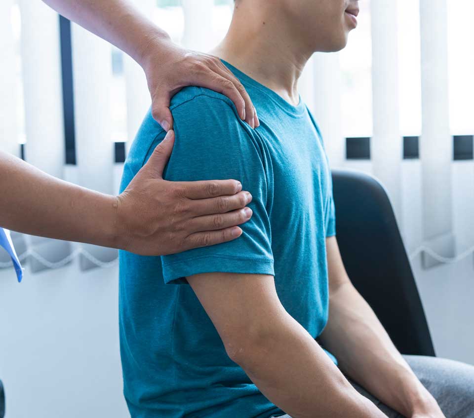 Spring Hill, FL Chiropractor a chiropractic treatment is performed on a man patient